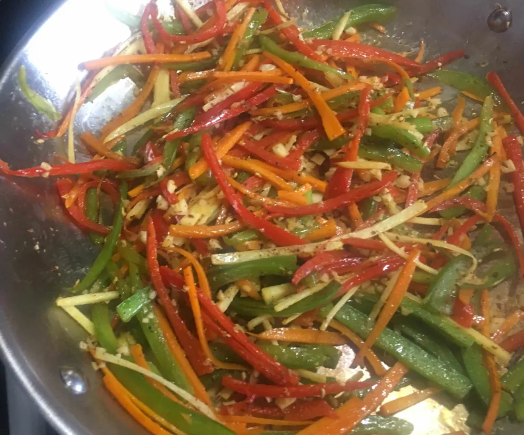 Quick cook of aromatics for Calgary Ginger Beef.
