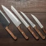 Kitchen Knifes On The Brown Wooden Table