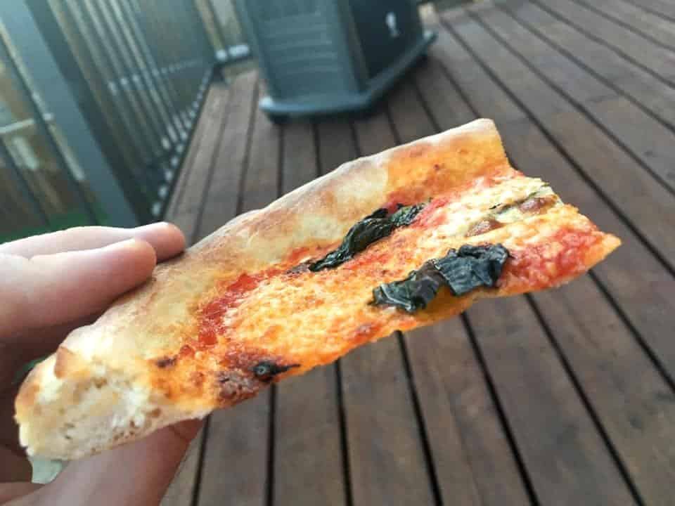 Thin crust Neapolitan pizza made at home using a baking steel.