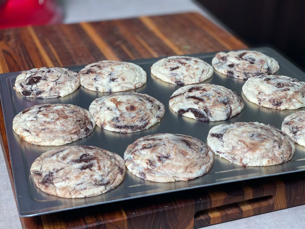 Heston Blumenthal's Golden Syrup Chocolate Chip Cookies on a 5 ply cookie sheet.