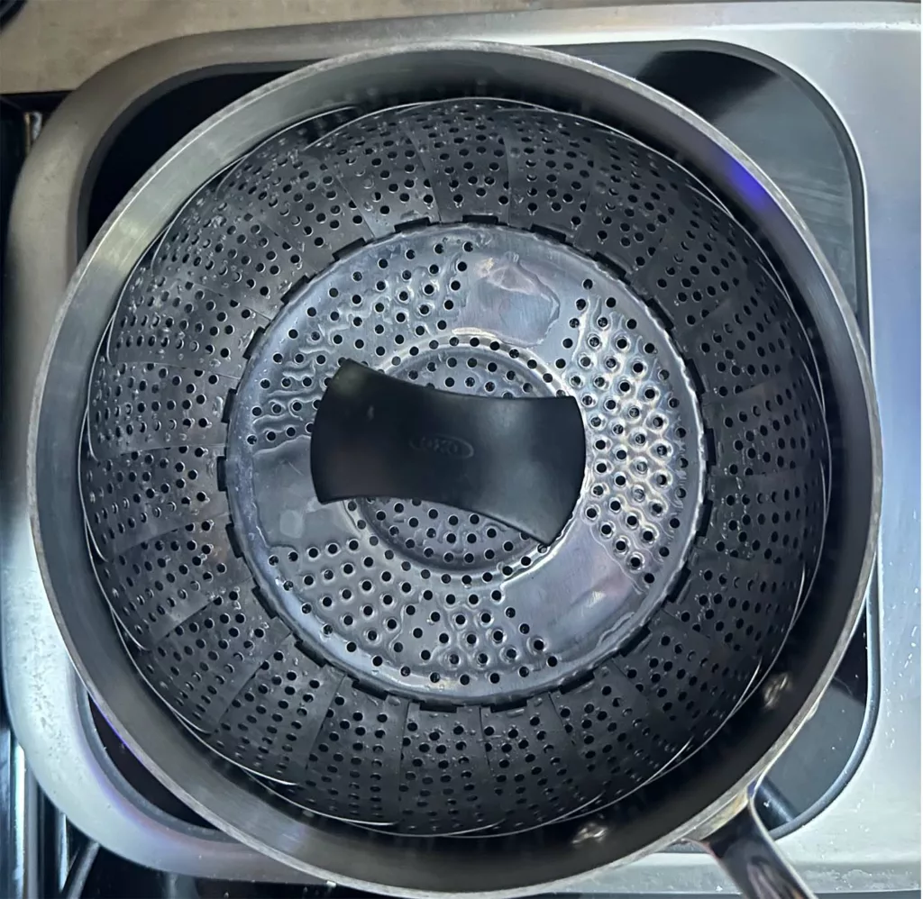 Empty OXO stainless steel steamer.