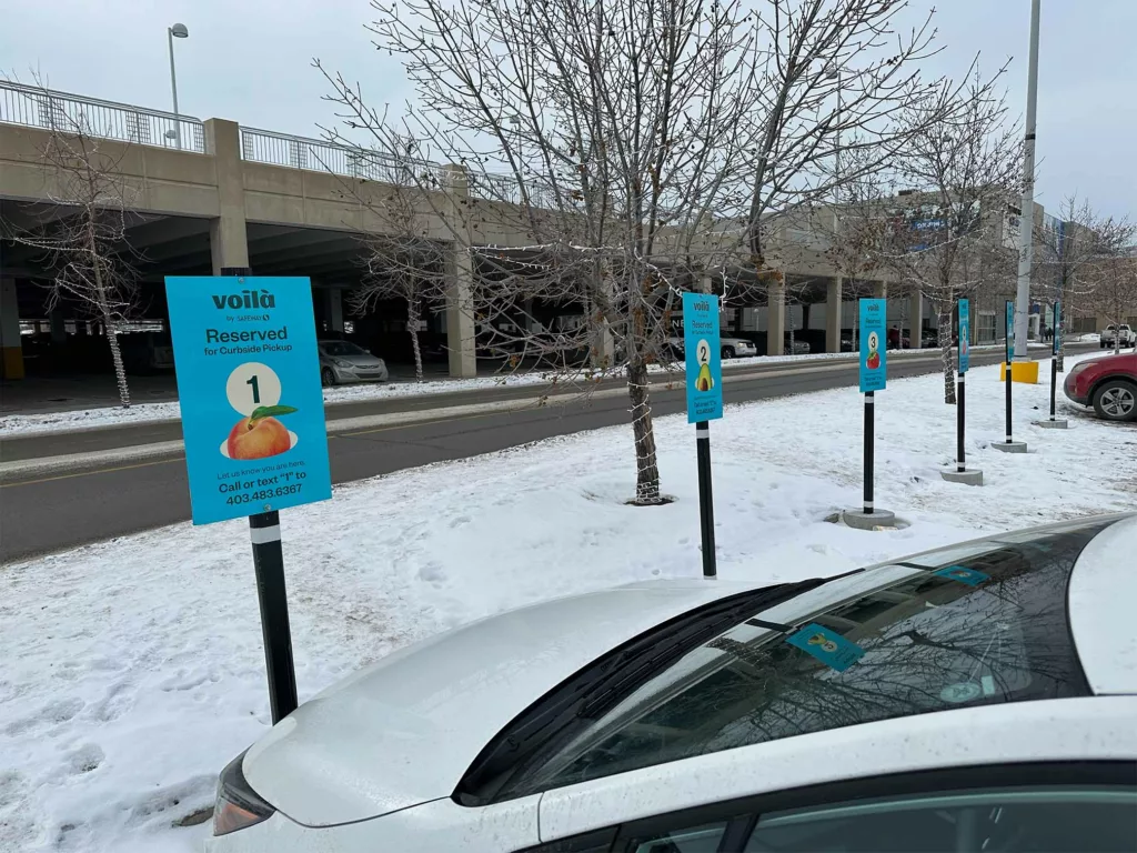 Safeway's Voila: Curbside Delivery signs.