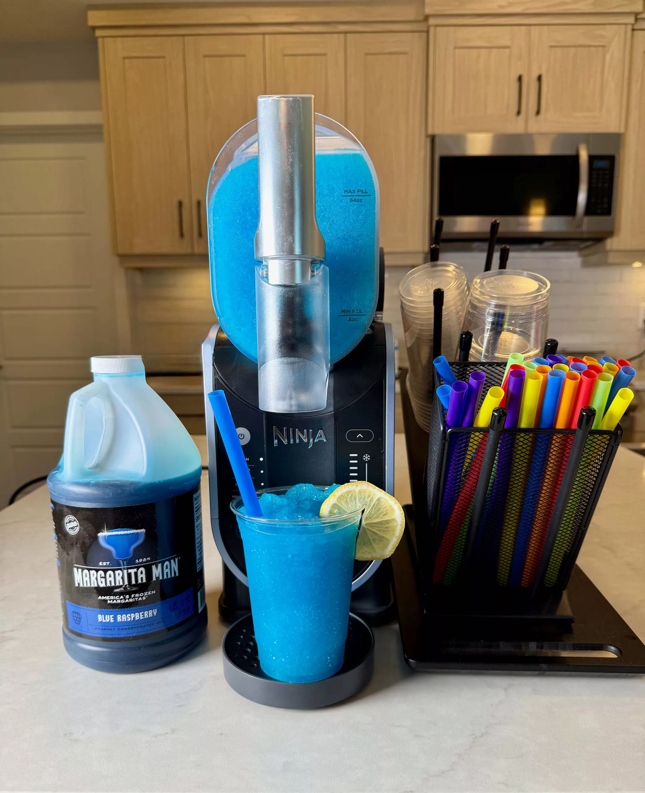 Blue Raspberry Slushed Drink made with Ninja SLUSHi and Margarita Man mix.
