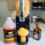 Mango Margaritas made with Margarita Man mix and the Ninja SLUSHi.