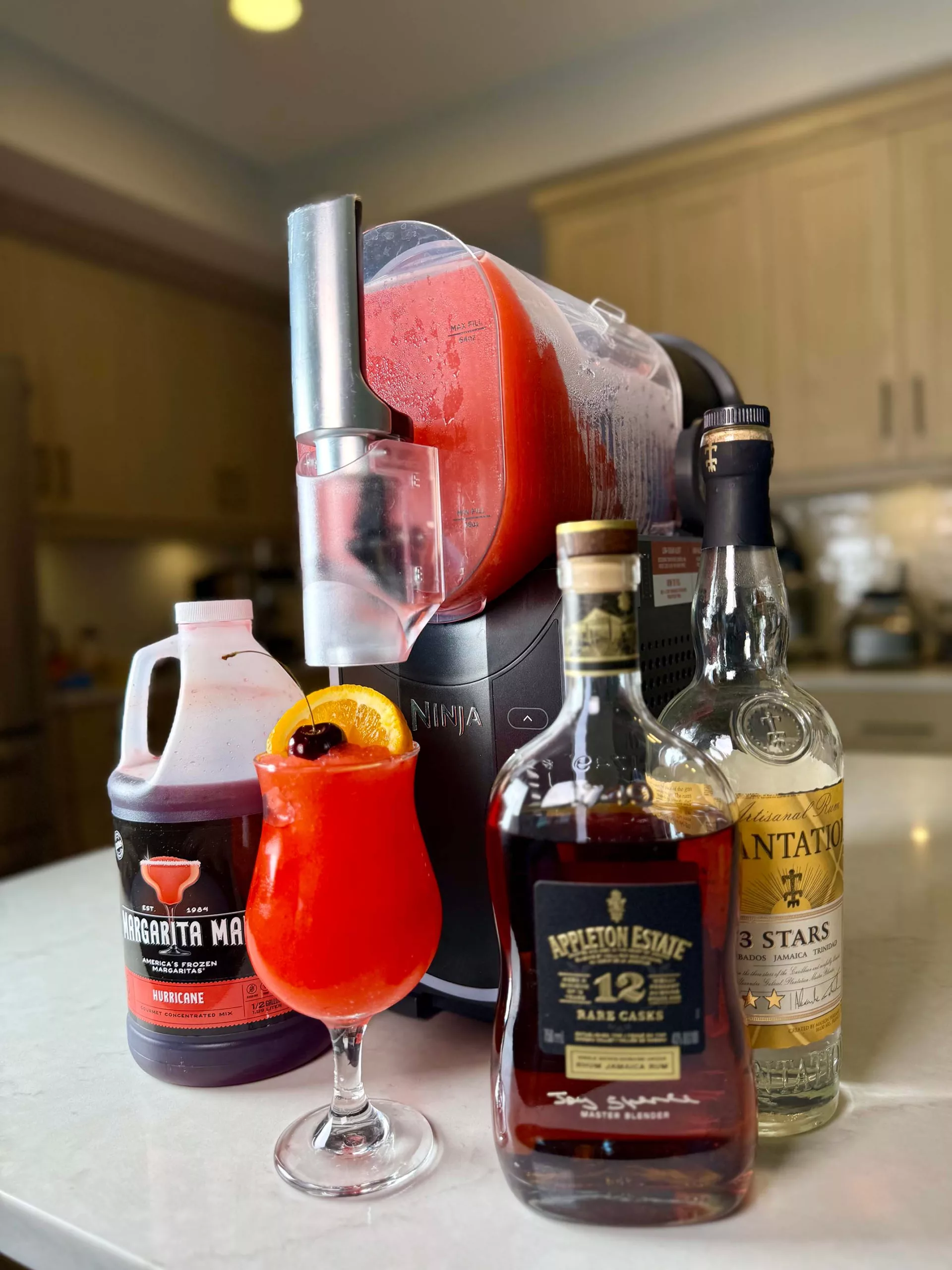 A frozen cocktail: Hurricane made in the Ninja SLUSHi with Margarita Man Mix.